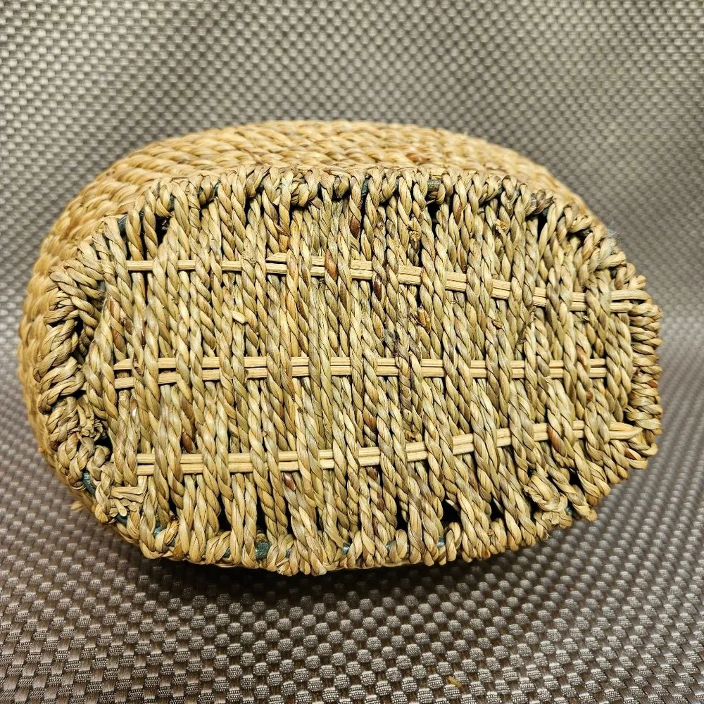 Vintage hand-woven coiled rye straw rattan wicker basket with metal leaf topper